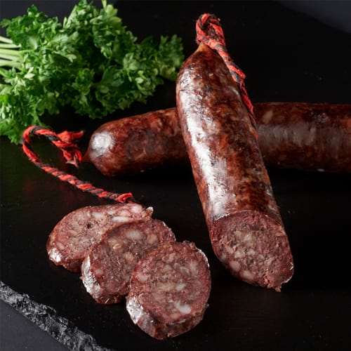 Geschnittene spanische Blutwurst butifarra negra Geschnittene spanische Blutwurst butifarra negra